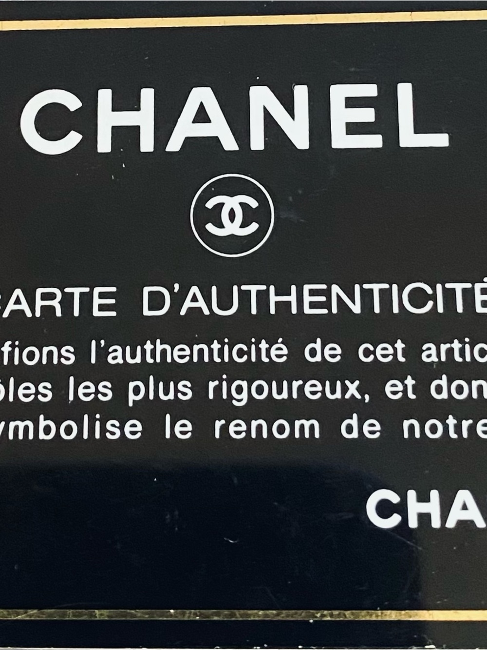 CHANEL Black and Gold Authentication Card
